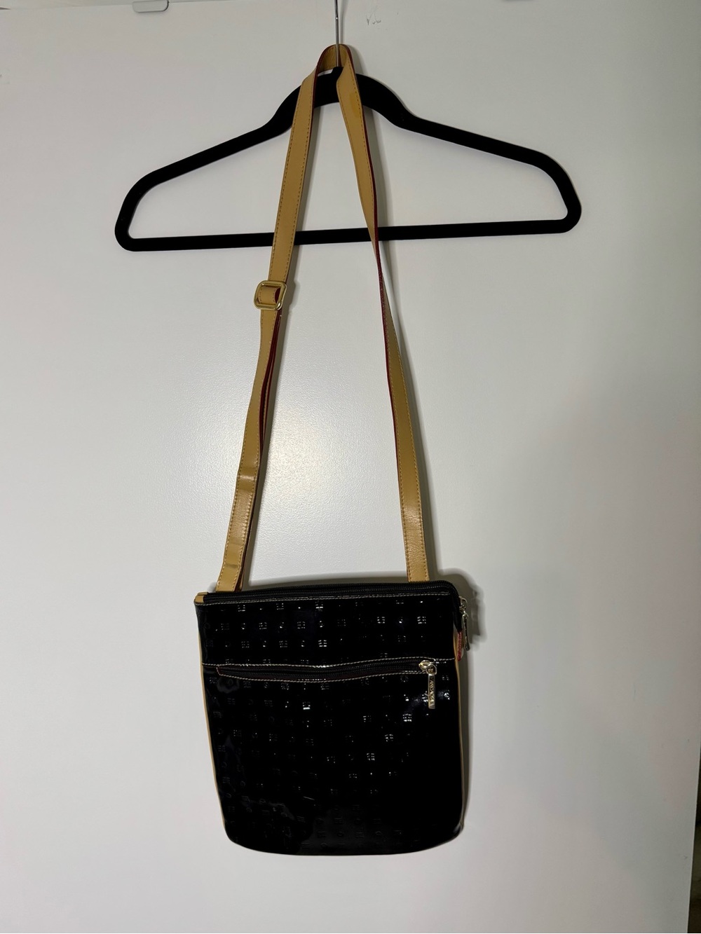 Italian made Arcadia Black Patent Leather Crossbody Bag with Tan Leather Strap.